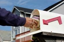 Putting mail in mailbox